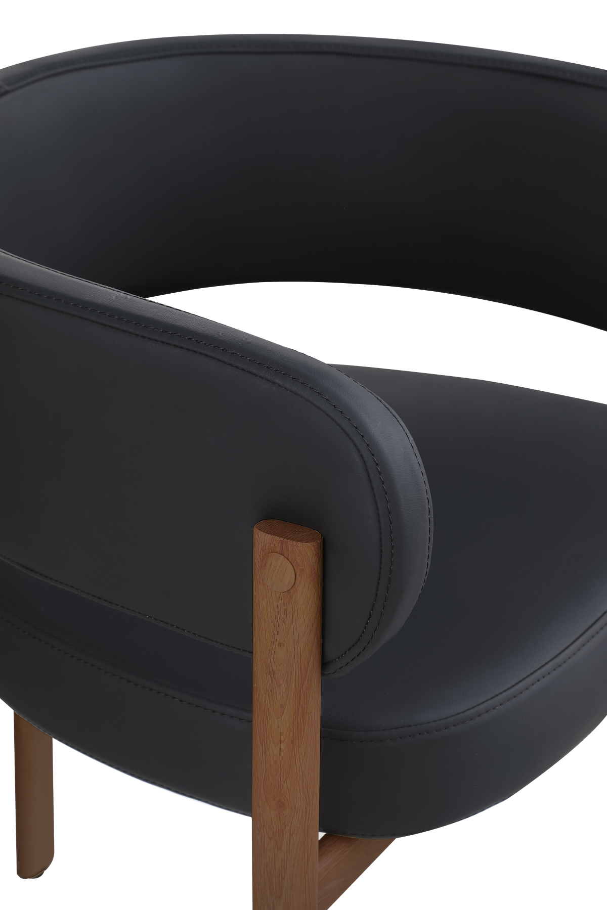 Curved-back dining chairs in black and walnut