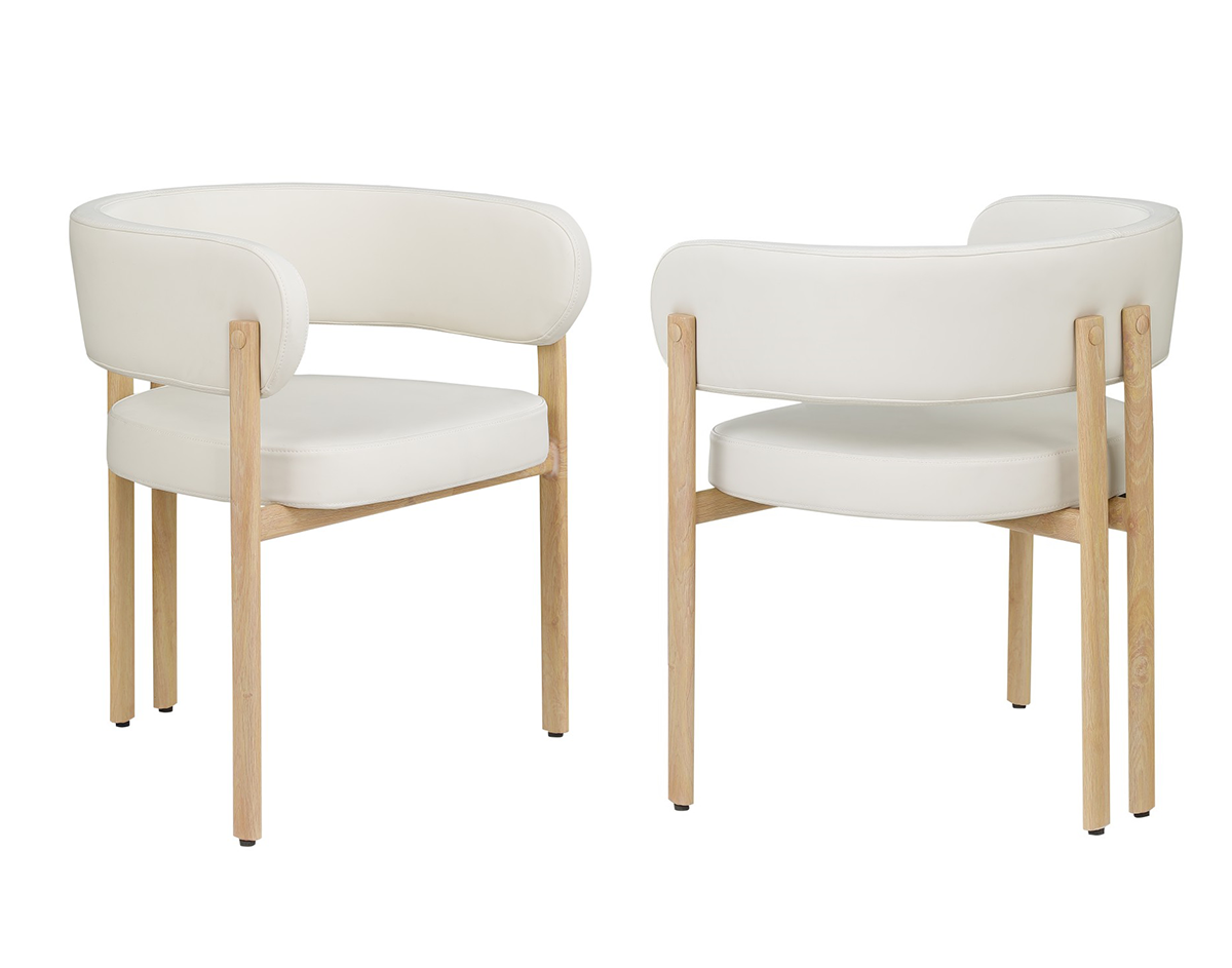 Curved-back dining chairs in cream and oak