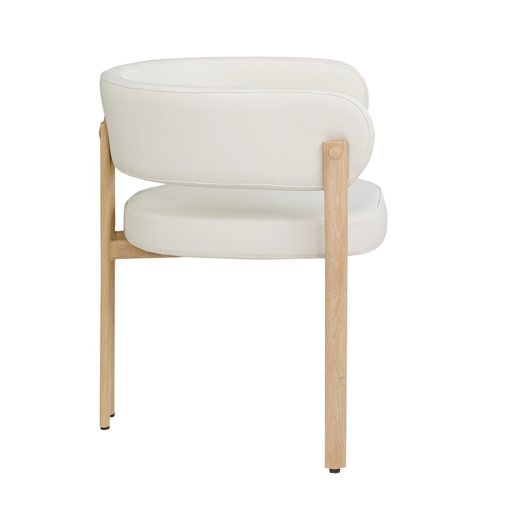 Curved-back dining chairs in cream and oak