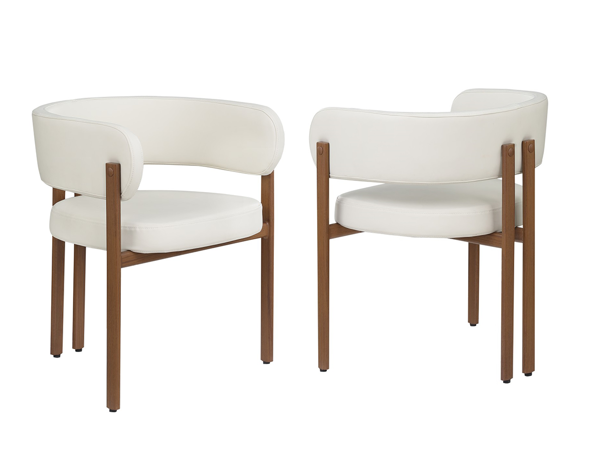 Curved-back dining chairs in cream and walnut