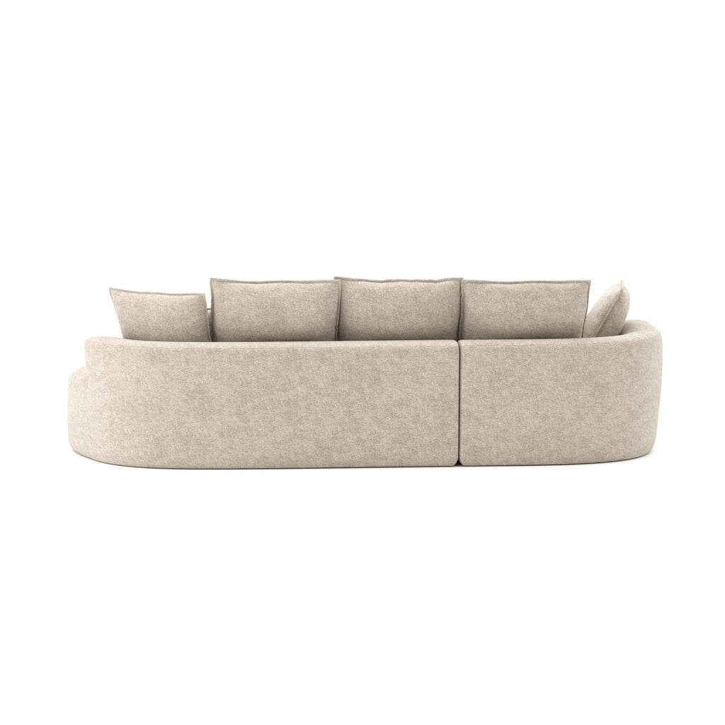 Curved sectional sofa in a box in beige